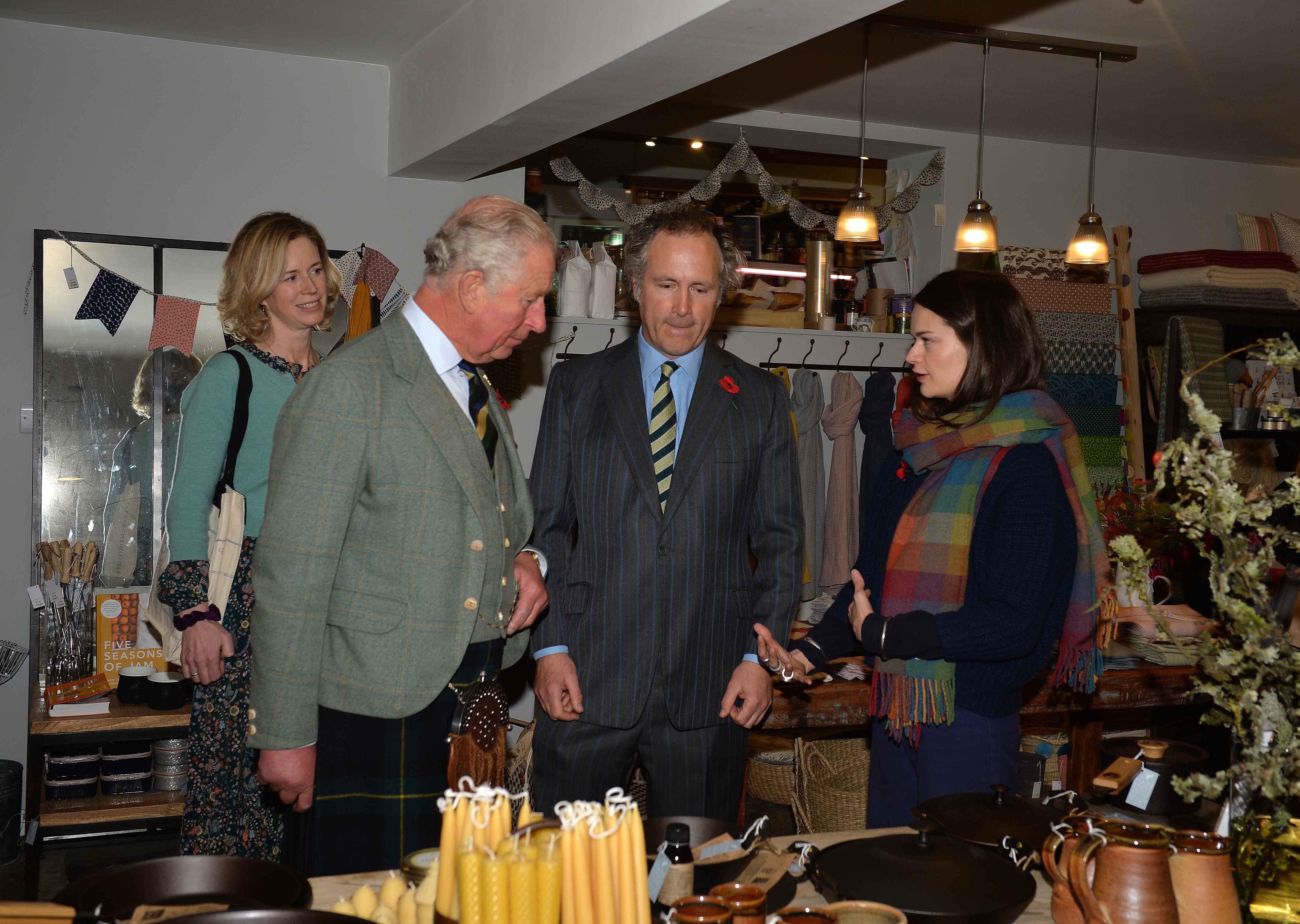 Phillippa Henley shows the Duke of Rothesay around the home ware area of Mainstreet Trading Company.