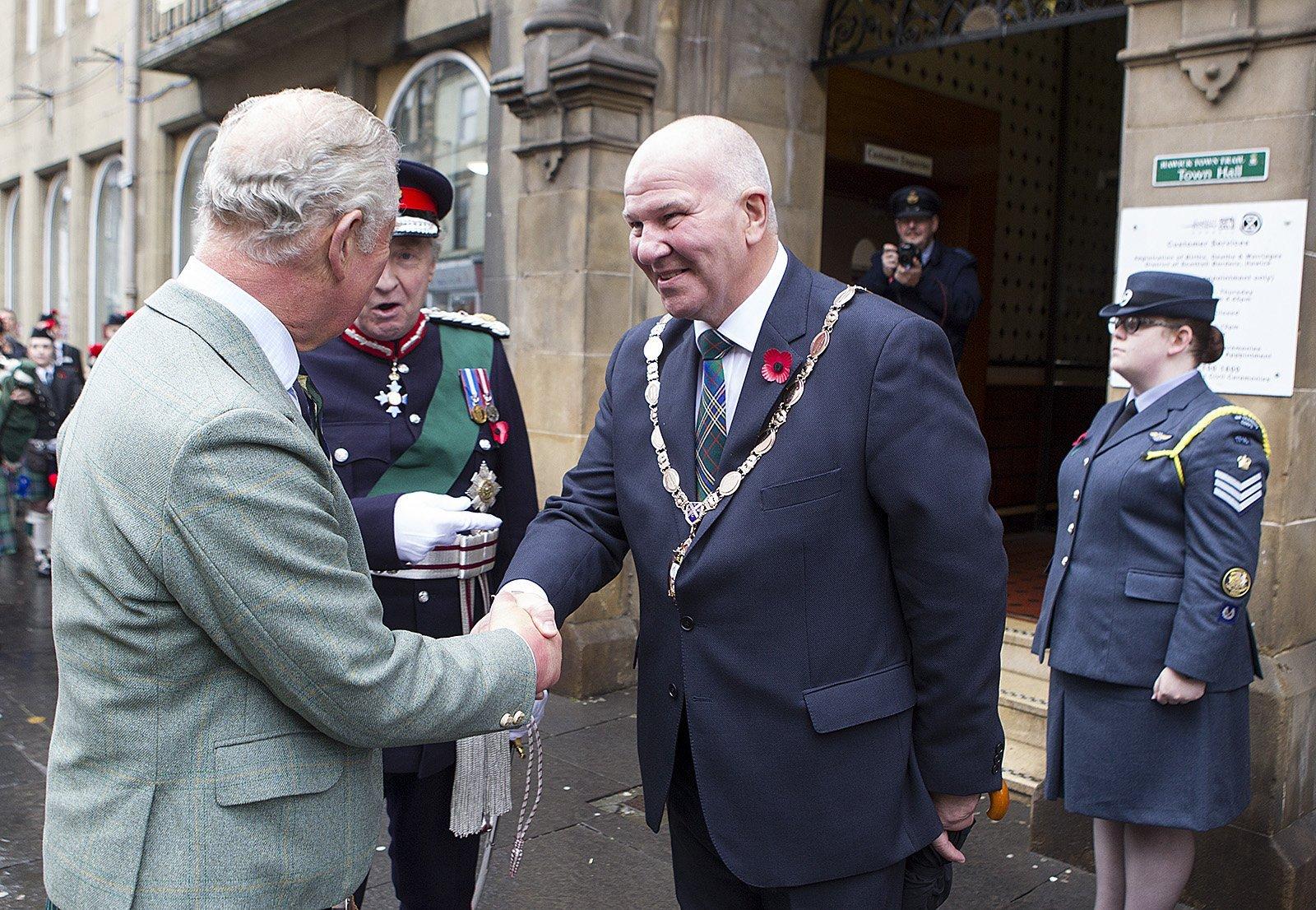 The Duke of Rothesay is greeted by honorary provost  Watson McAteer at Hawick town hall.