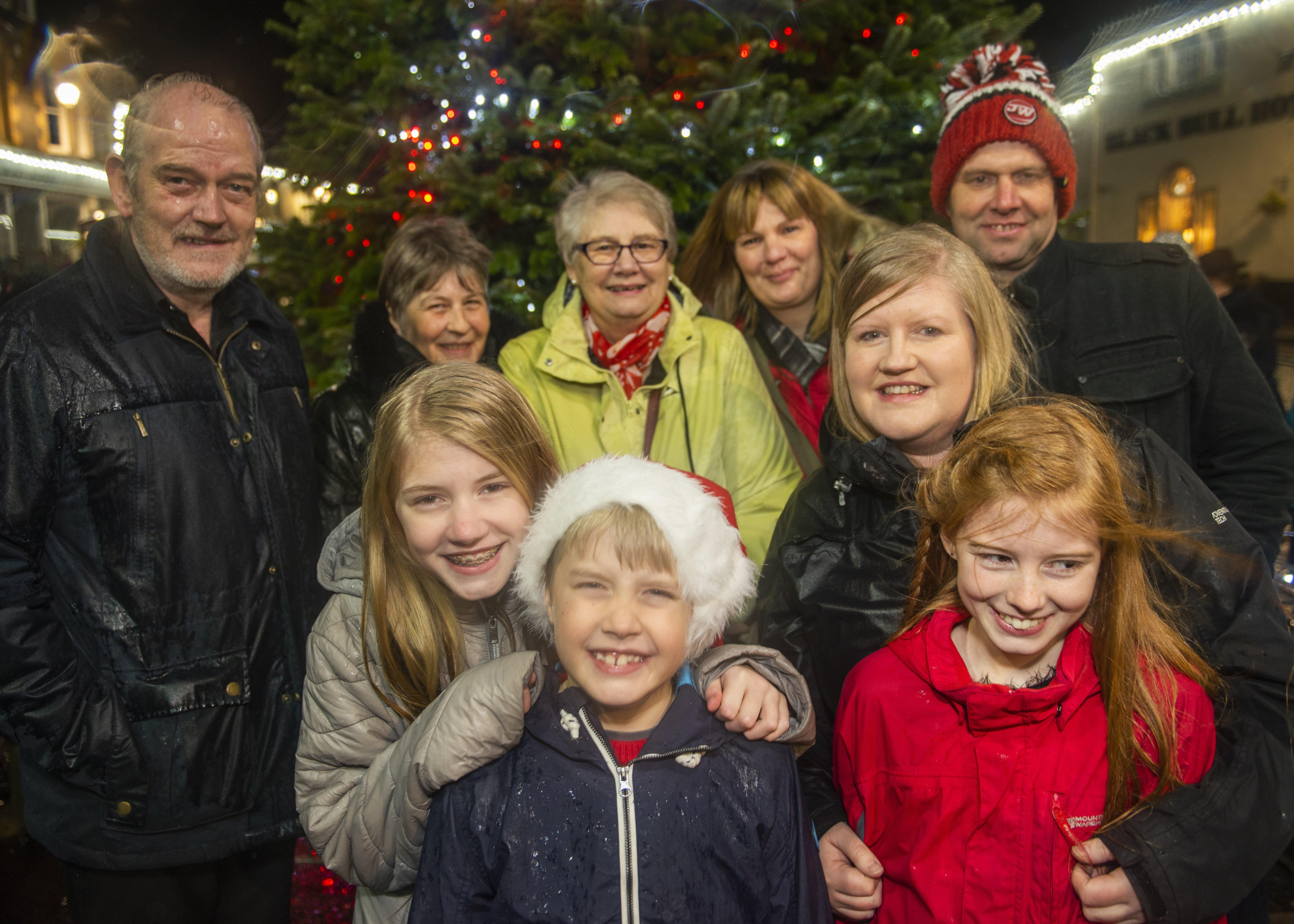 The Batchelor family gather around Alexander Batchelor (front centre), the boy given the honour of switching on Lauder's Christmas lights this year.
