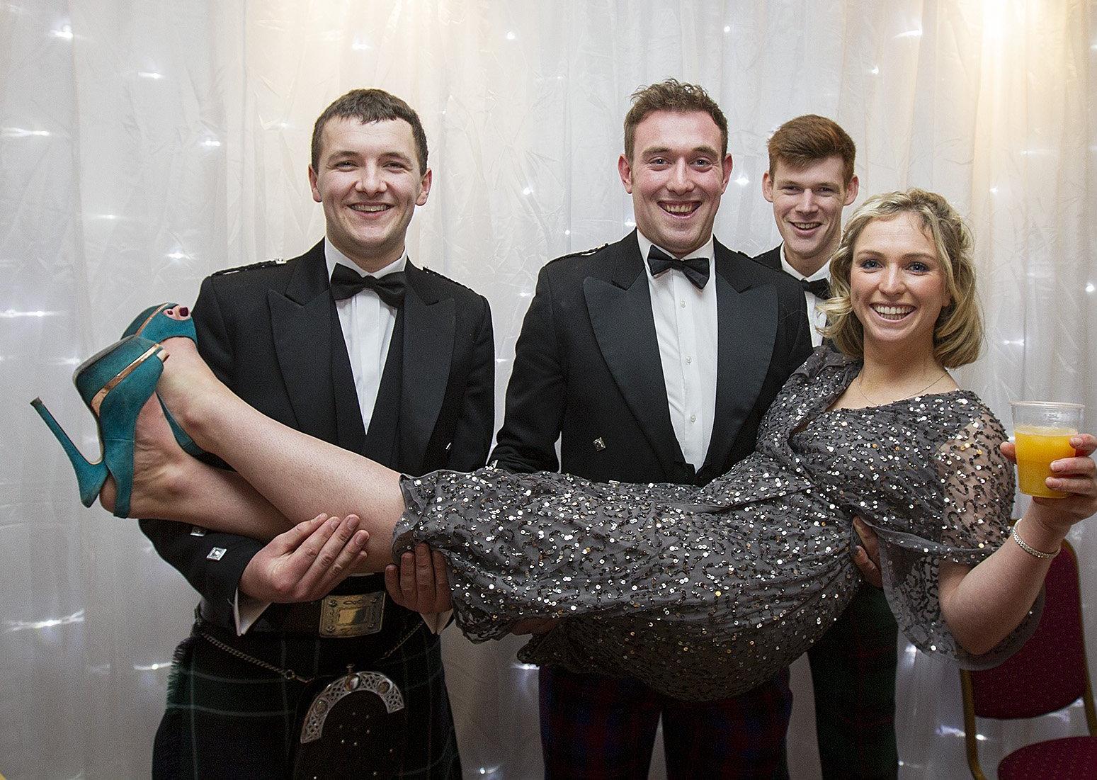 Stewart Shaw, Andrew Dixon, Emily Douglas and Stuart Walker at a young farmers' ball held in Kelso on Friday.