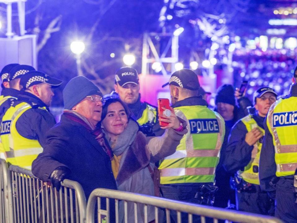 Hundreds of police, including armed officers, created a "reassuring presence" on the streets, alongside event stewards.
