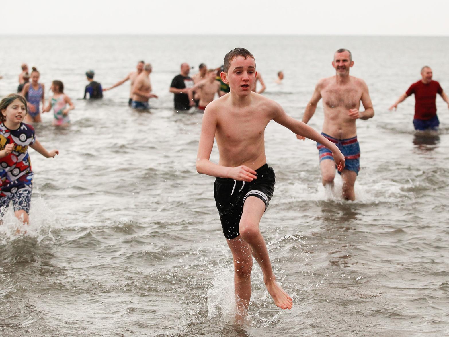 Many chose to brave the icy waters at Portobello Beach. Pic: Scott Louden.