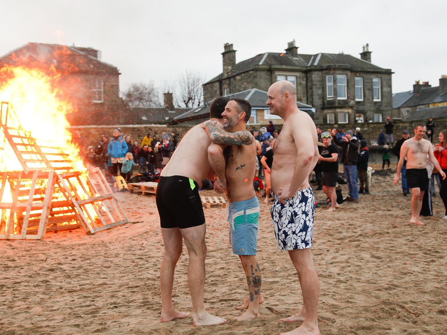 The dookers were clearly enjoying themselves in Portobello, with a big fire at the beach providing some warmth. Pic: Scott Louden