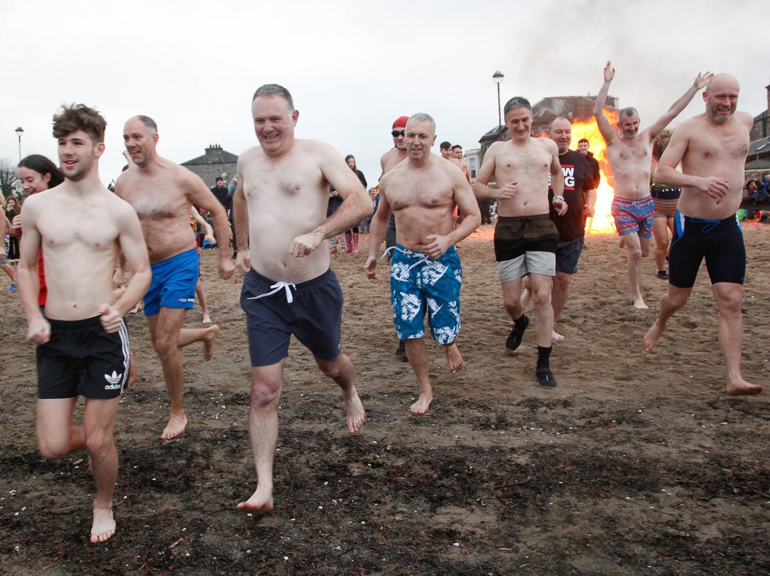 Hundreds turned out for the loony dook at Portobello Beach. Pic: Scott Louden