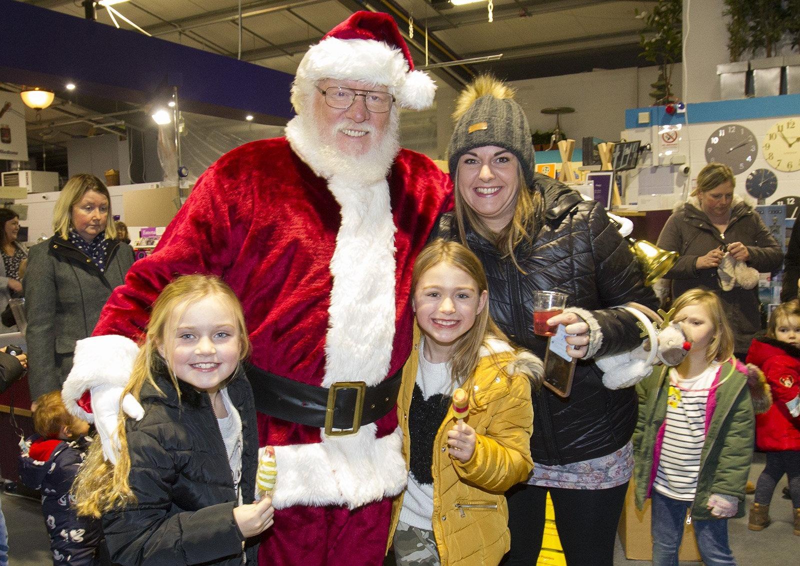 Holliy and  Kerrie Cunningham with Sophie Douglas with Santa (Francois DuFlessis)