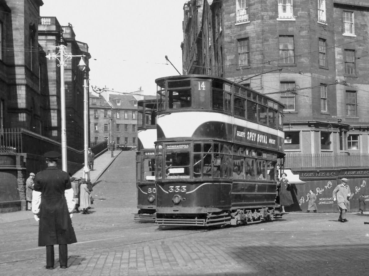 Tram 333 turning into Princes Street at the top of Leith Street, a view that has changed many times since and is currently in flux with the building of the St James Quarter. All that remains from this picture is James Craig Walk (currently closed) along the perimeter of the office of the National Records of Scotland.