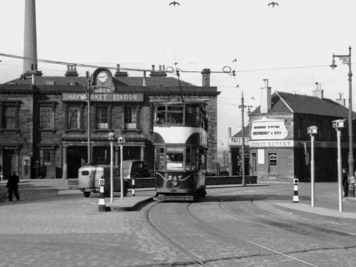 Haymarket Station has undergone a massive redevelopment since Tram 347 passed by. The restaurant on the right was demolished to make way for the new tram stop and extension of the station itself.