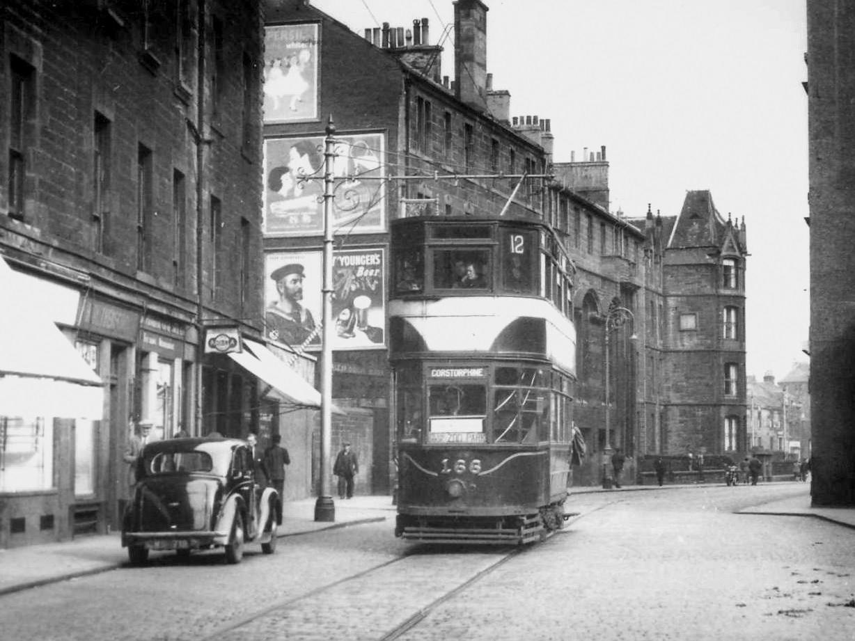 The billboard adverts are typical of their time and while Duke Street has changed it's still just recognisable in this 1953 image, in which Tram 166 heads towards Easter Road.