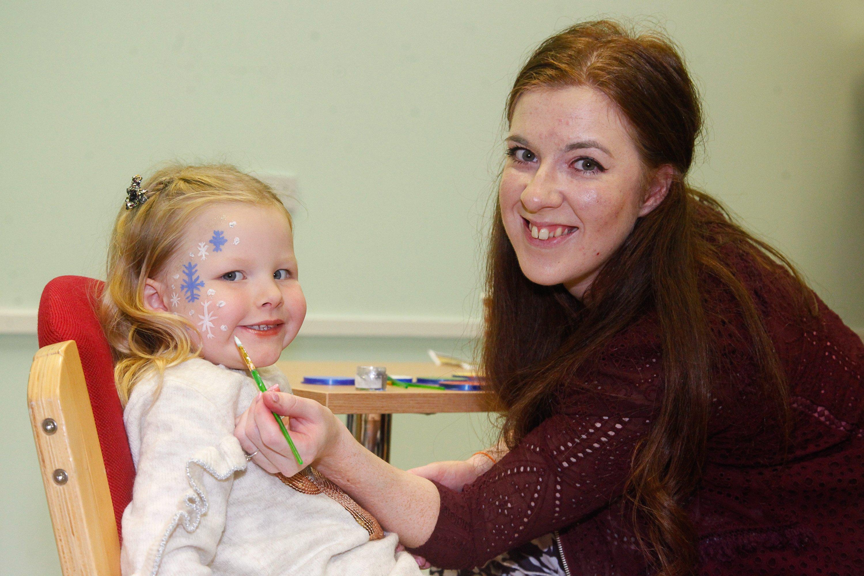 Camelon Winter Festival on Sunday, November 24. Farrah Allen-Burns (5) from Camelon has her face painted by Lois from Falkirk Vineyard Church. Picture by Scott Louden.