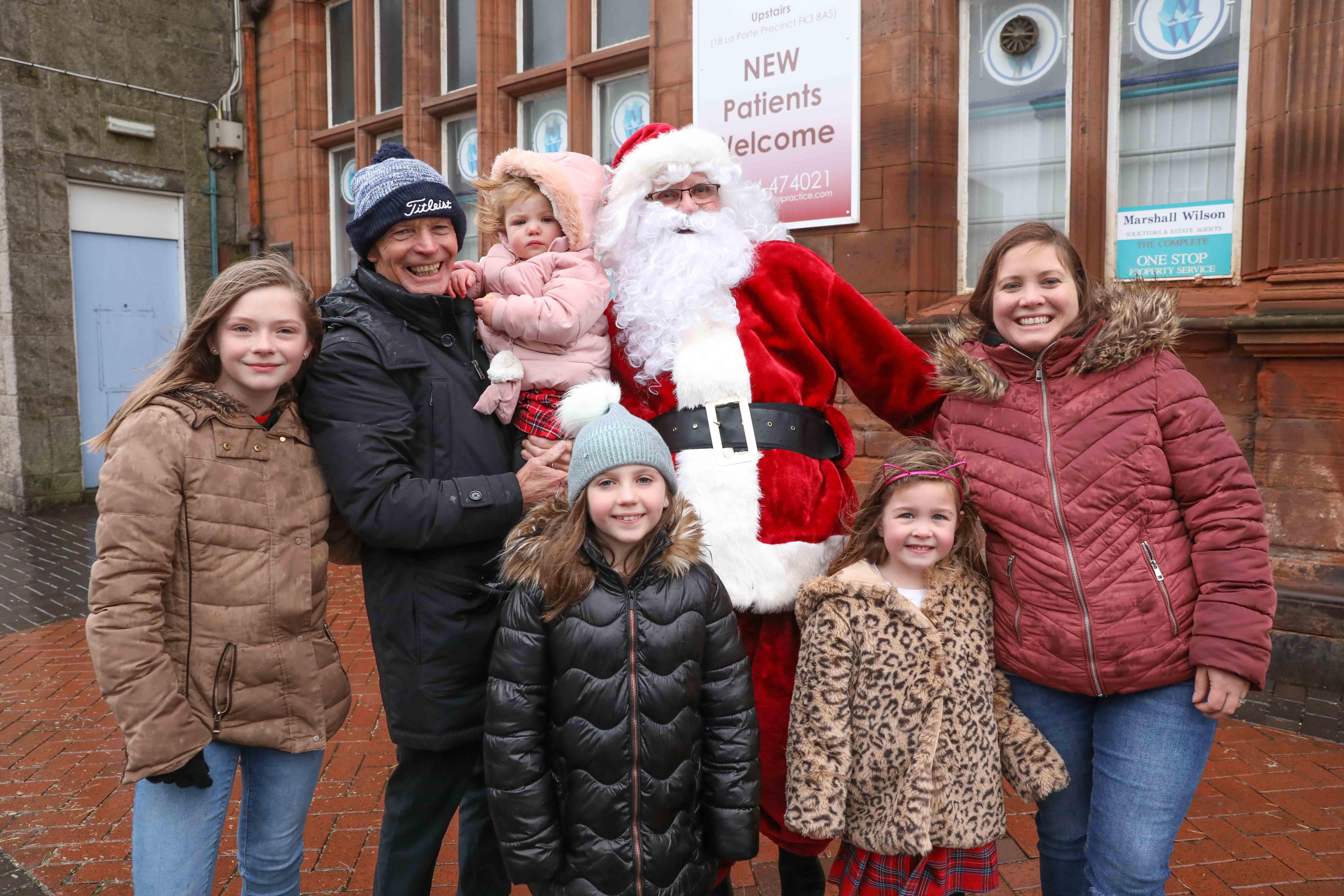 Grangemouth Christmas Lights switch on. Santa meeting the Newton family from Grangemouth. Picture by Jamie Forbes.