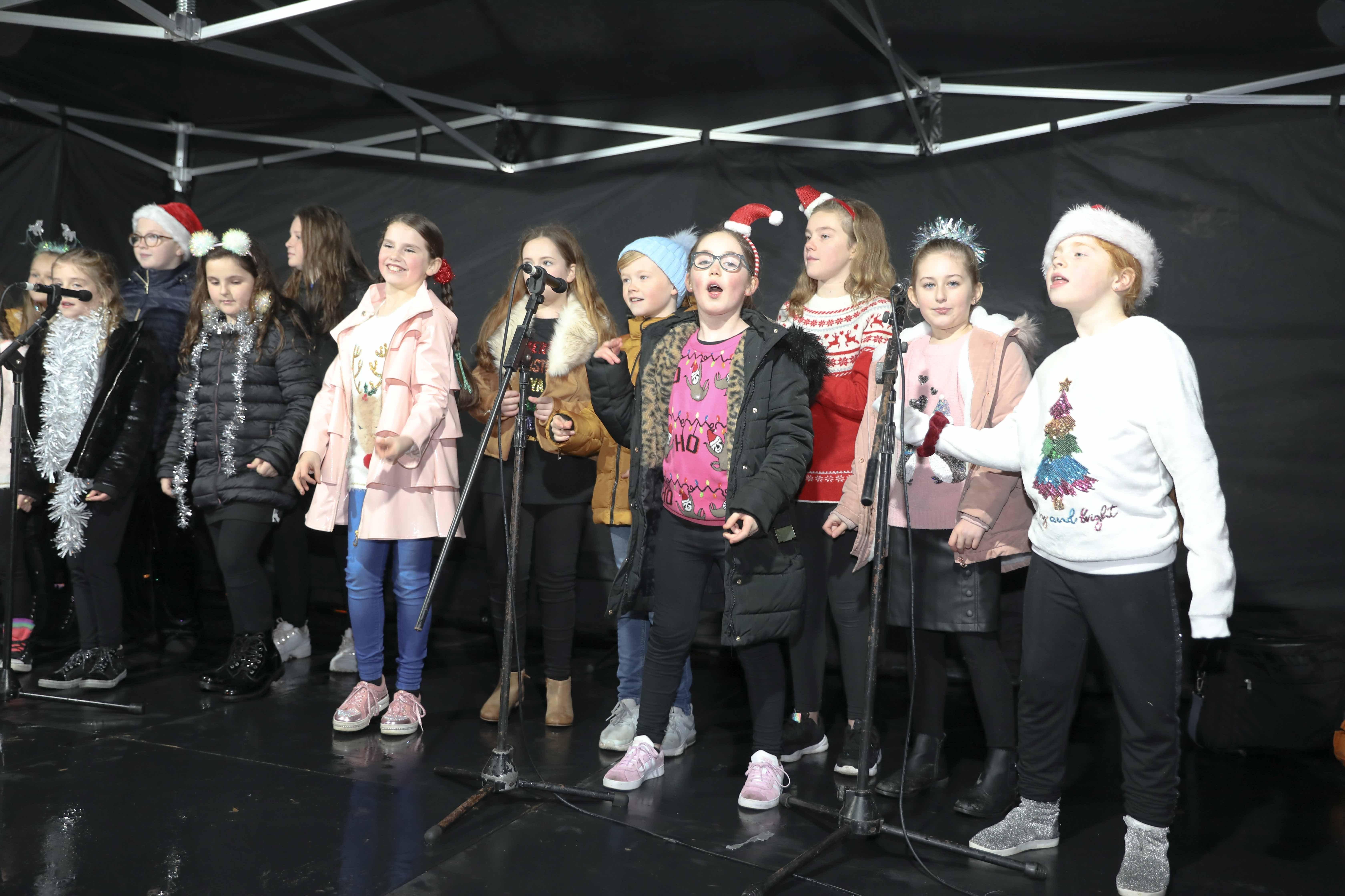 Christmas lights switch-on in Bo'ness on Saturday, November 23. Children join in the singing. Picture by Jamie Forbes.
