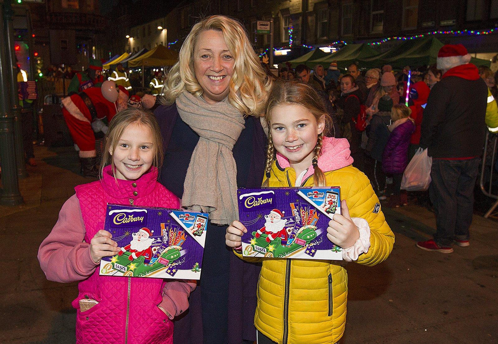 Bethany Bell, Tracey Brown and Caitlin Rae with their selection boxes from Santa