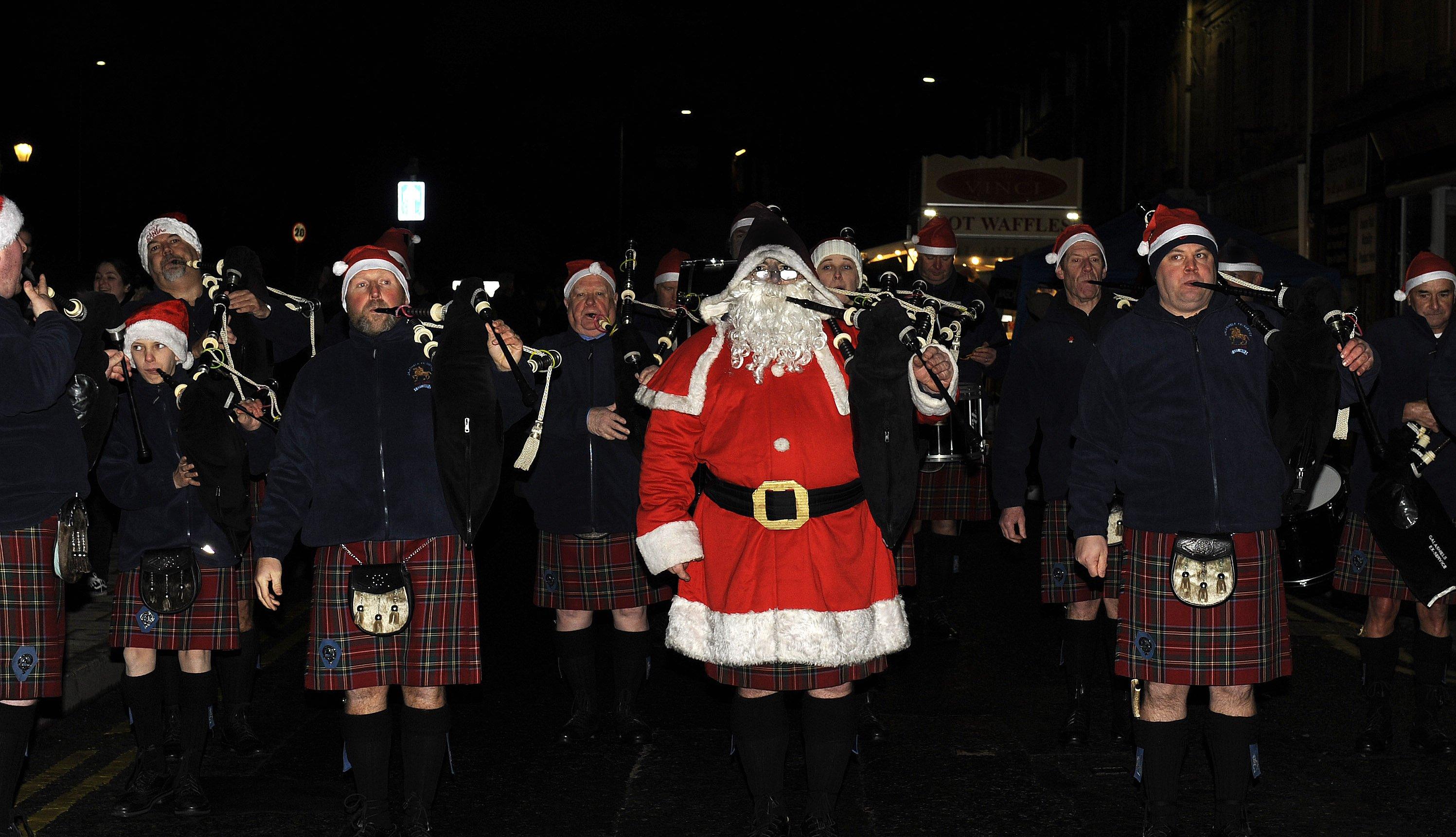 The pipe band in Bank Street, with Santa helping out.