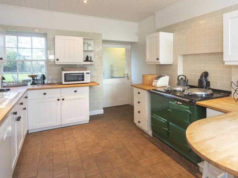 The kitchen comes complete with an Aga.