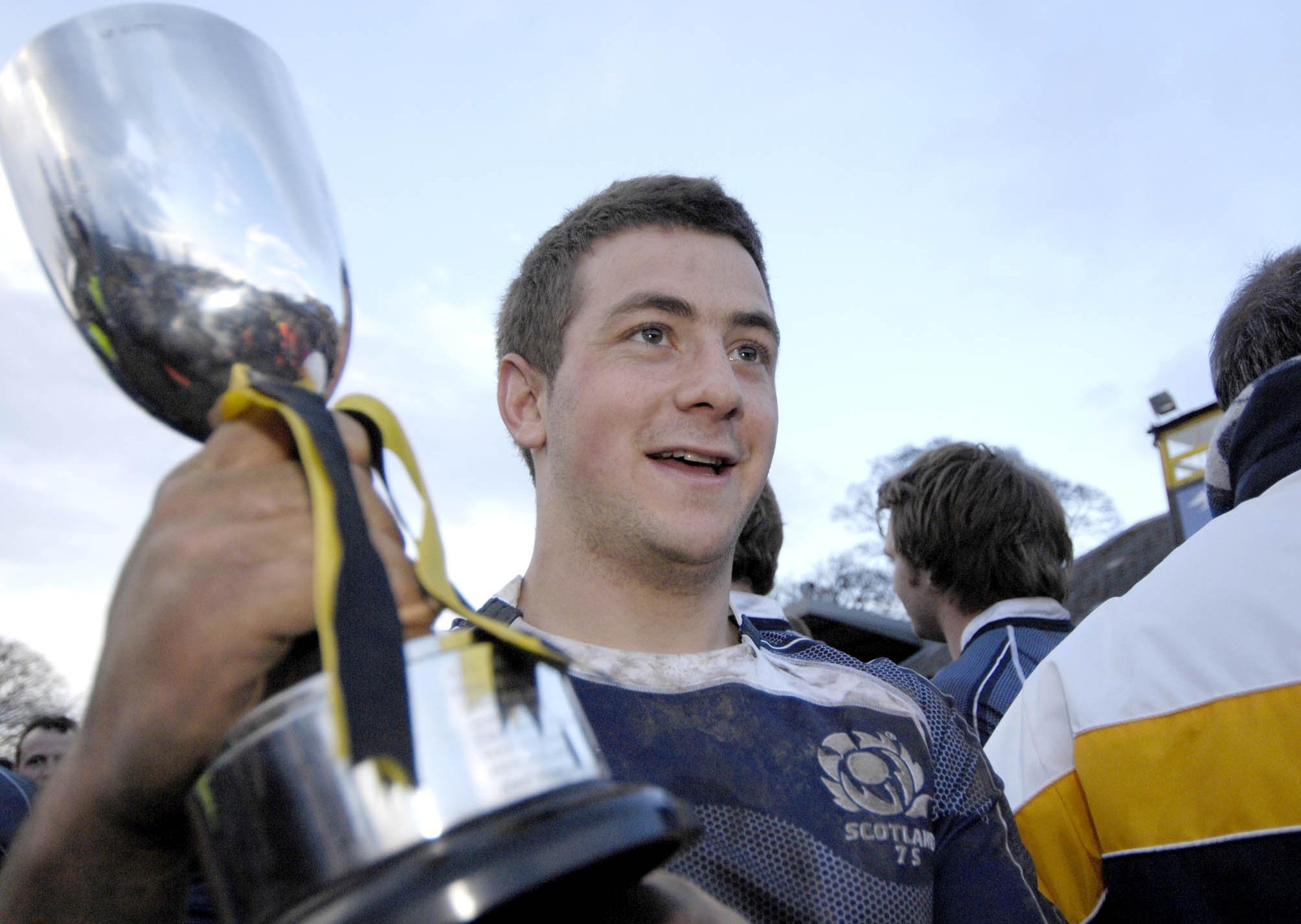Greig Laidlaw wins the 125th Melrose Sevens with Scotland 7s development team, the Scottish Thistles, in 2008.