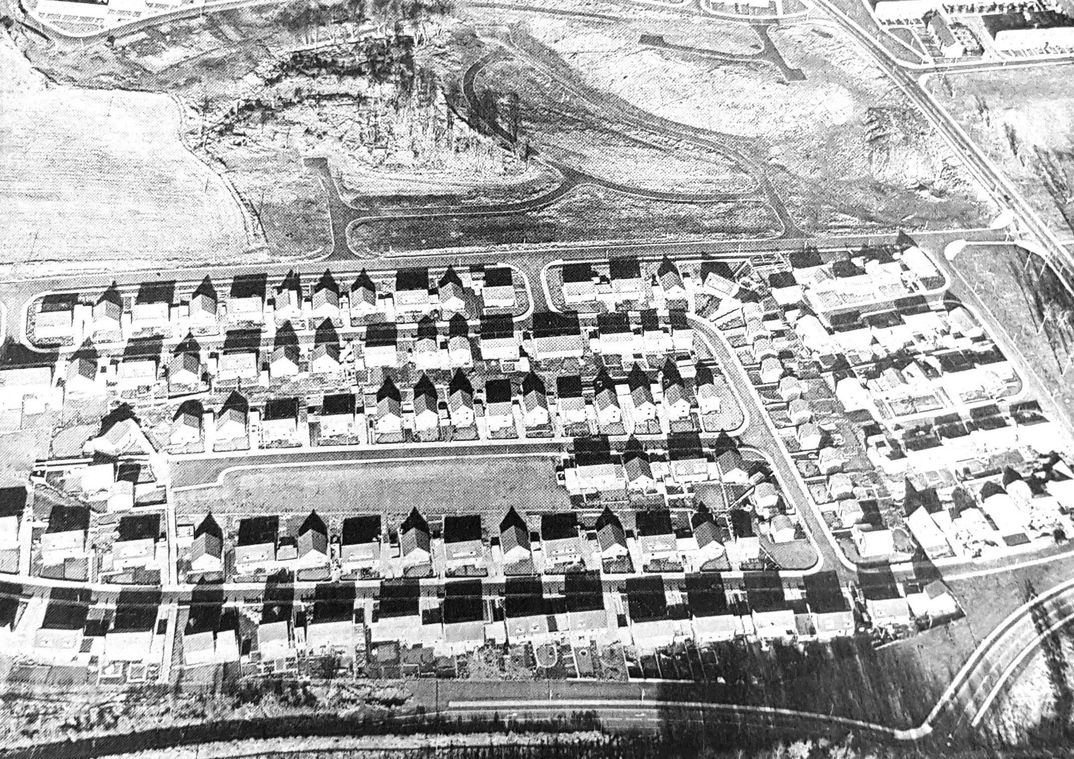 This shows the newly built Newliston housing estate at the west side of the town, with Torbain Road running along the bottom of the picture.