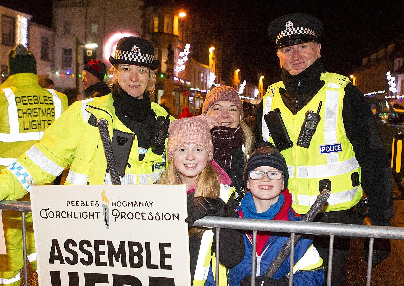 Community Police Officers Diane Sorrell and Chris Burnside with Kerry Duncan, and Eve and Struan Hume