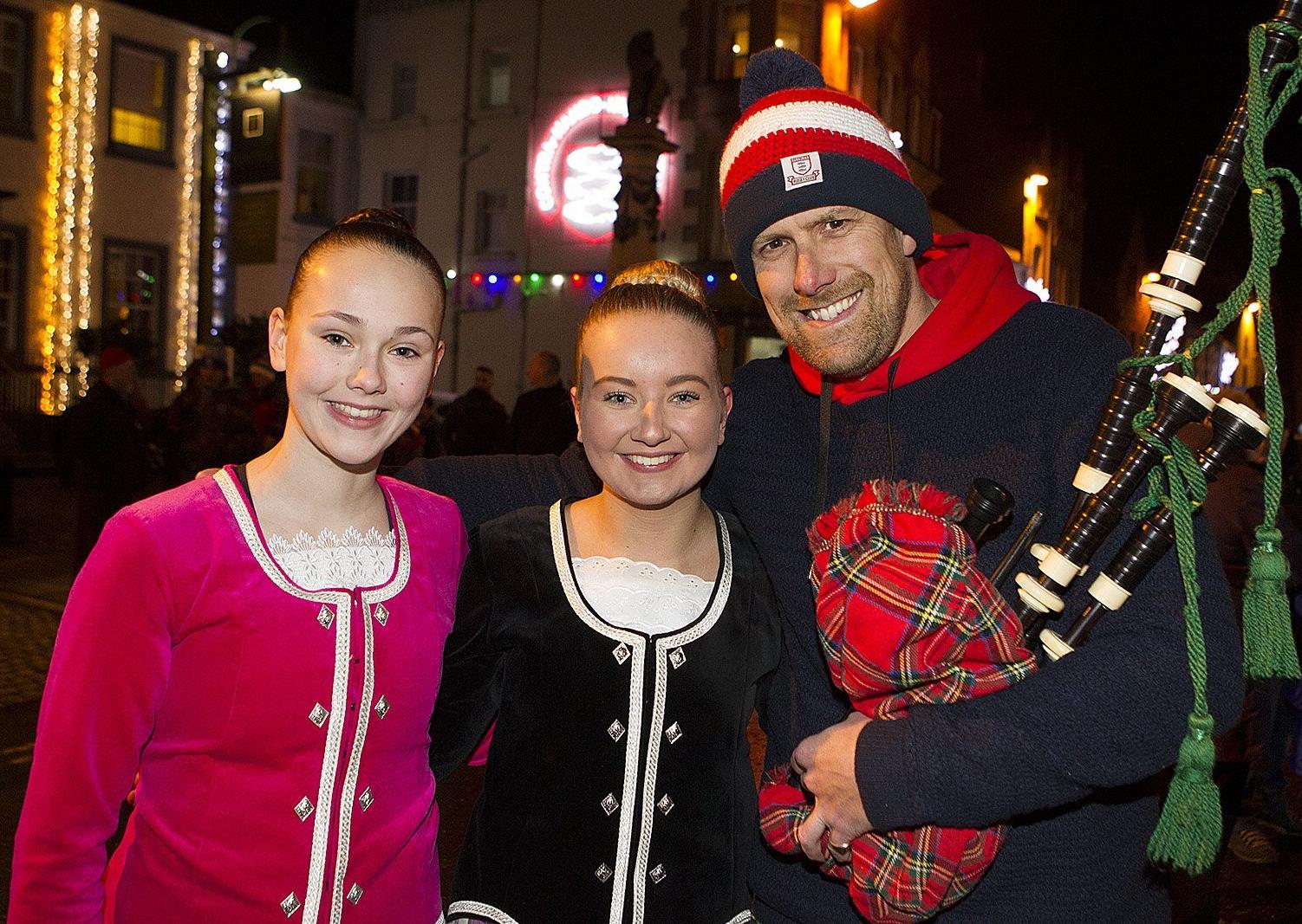 Piper Mark Thomson from Peebles RFC with Highland Dancers, Imogen Smith and Hannah Panlin