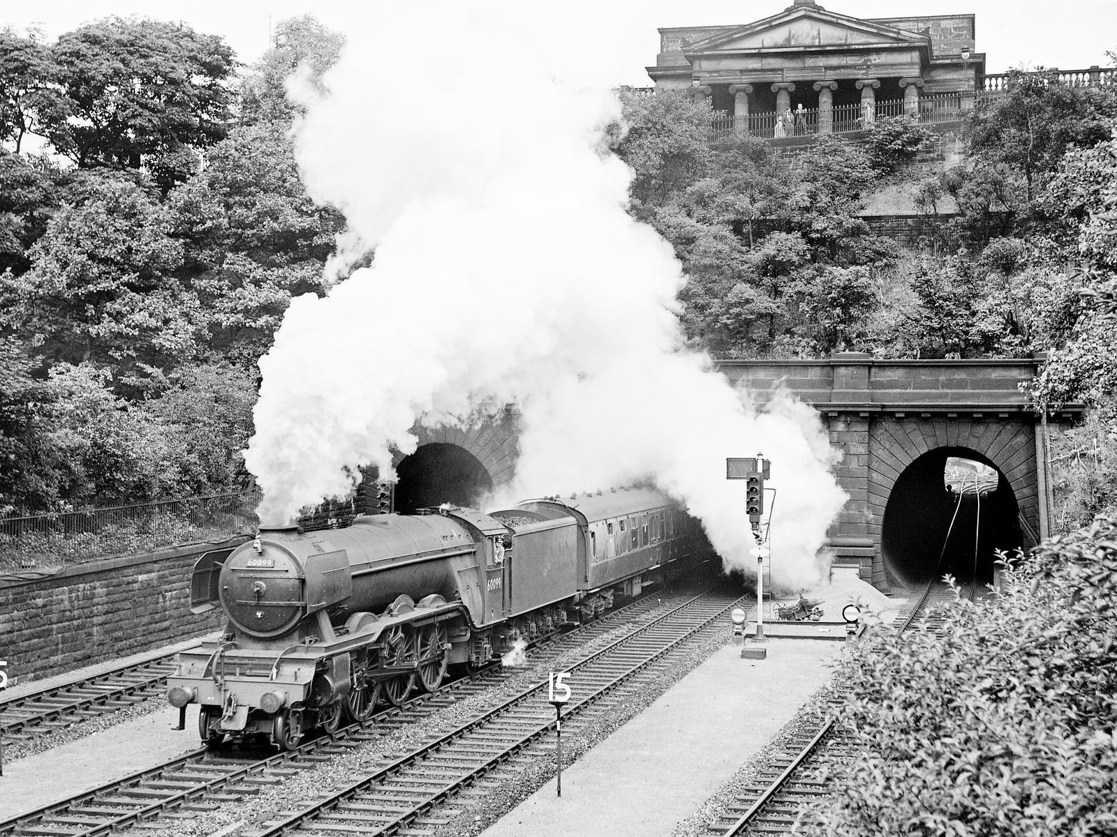 Call Boy, a Class A3 4-6-2 engine (No 60099) emerging into Princes Street Gardens, on the 4.03 pm Edinburgh Waverley to Inverness service on 21st July 1961.