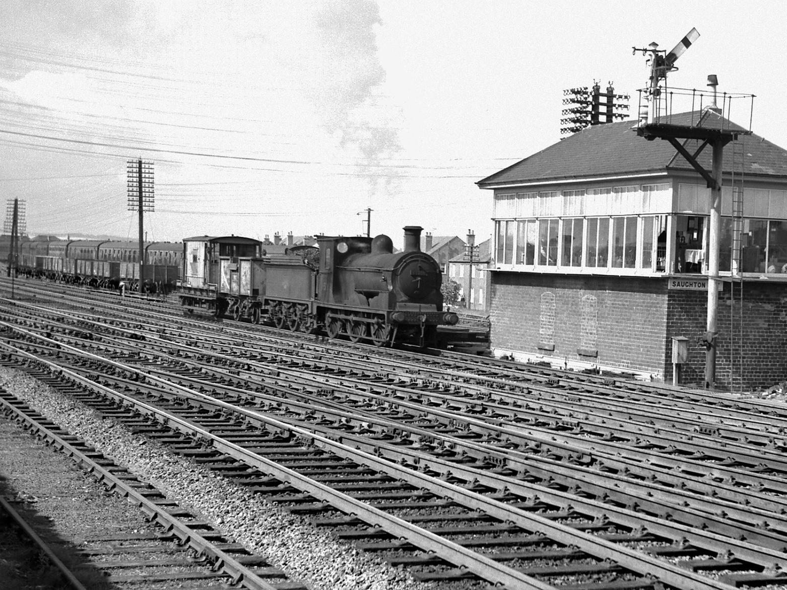 Class J36 No 65288 passes the signal box at Saughton in 1962 with a short freight train consisting of one mineral wagon and a brake van.