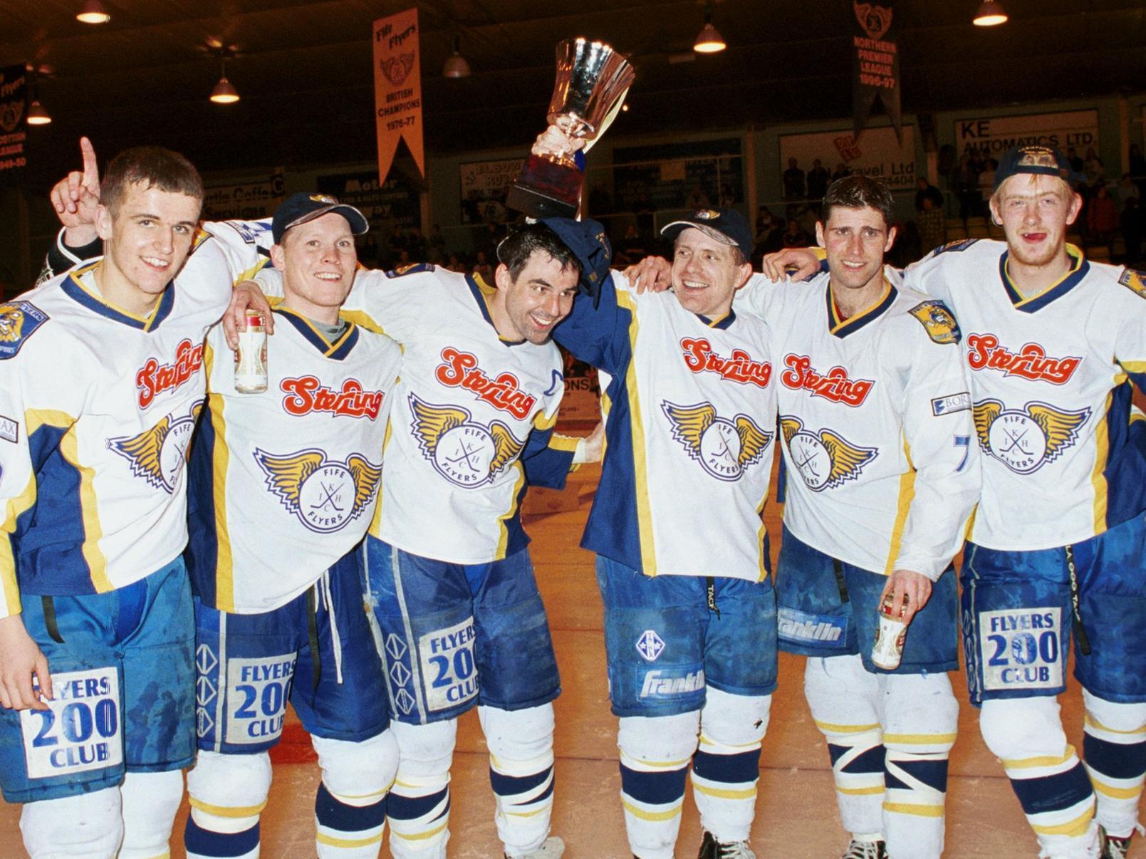 Celebration time for Paddy Ward, Ted Russell, Frank Morris, Derek King, Bill Moody and Kyle Horne