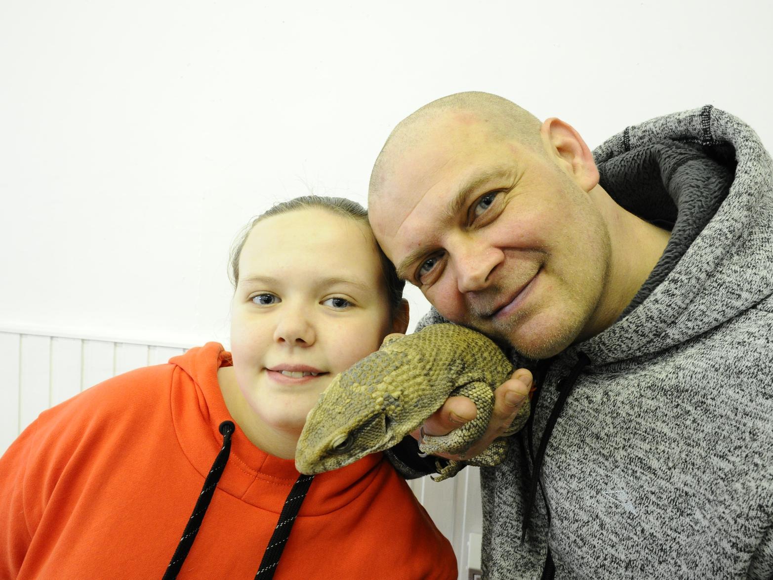 Bothkennar Activity Centre - Gary and Heidi Miller with Cher the Bosc monitor lizard.