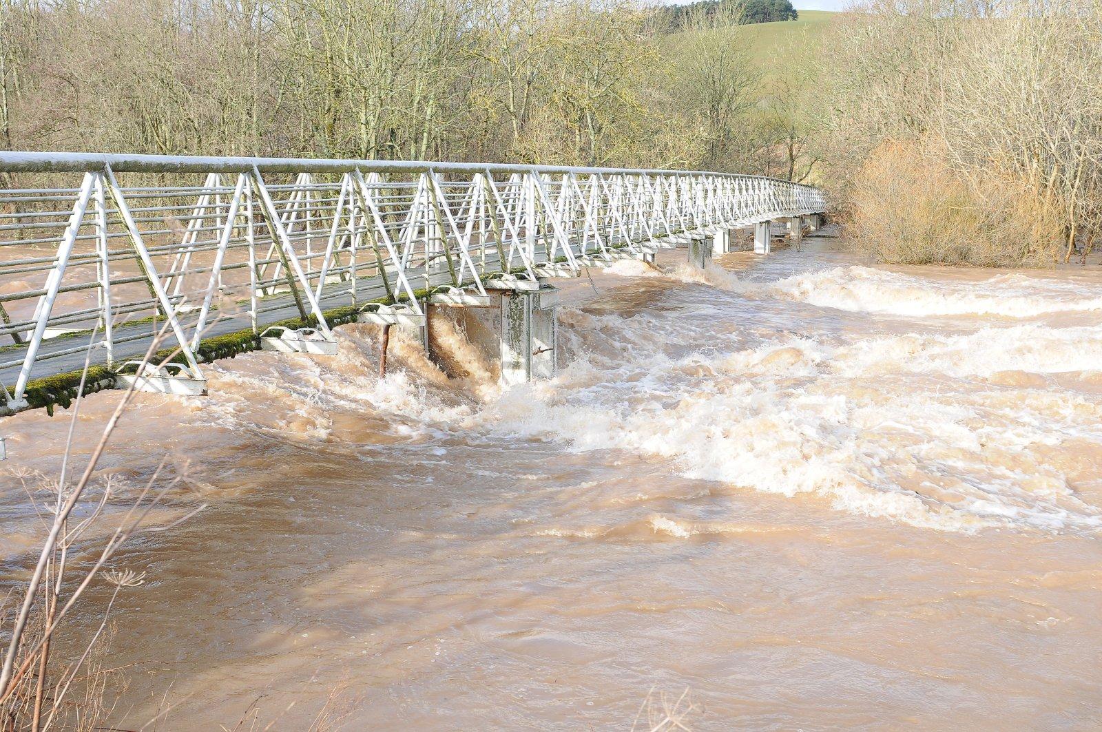 High water at the bottom iron bridge over the Ettrick Water at Selkirk.
