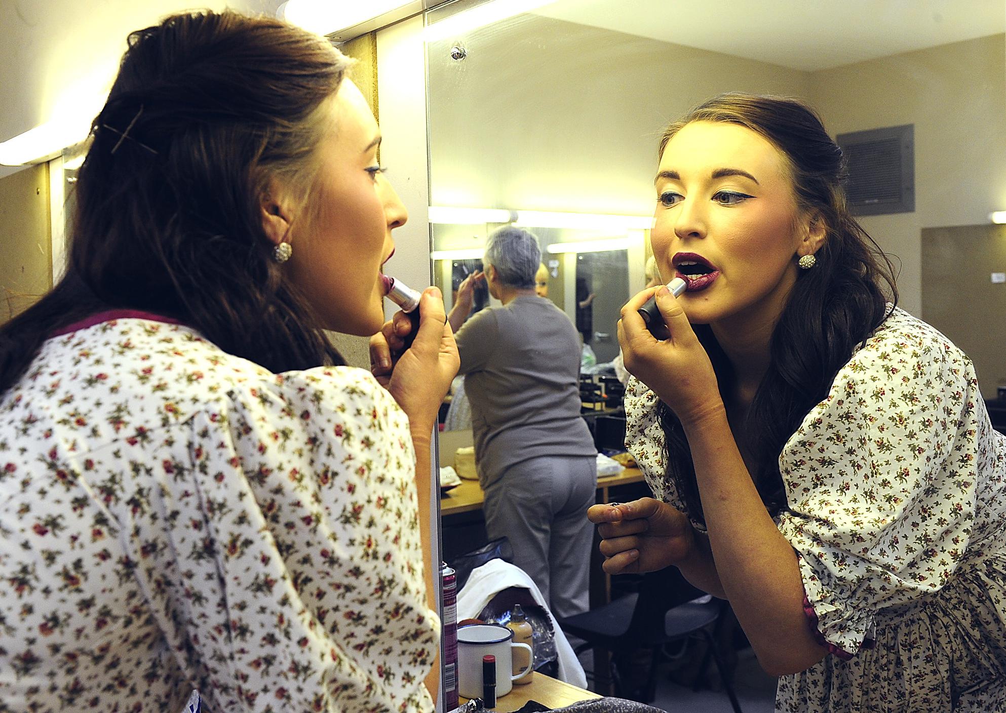 Selkirk Opera. Carousel. The leading lady Julie Jordan (Mandy Rayner) puts the finishing touches to her stage make up.