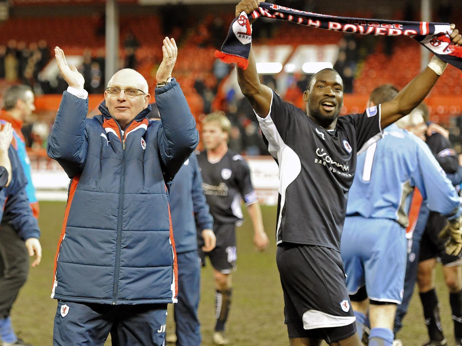 Raith Rovers manager John McGlynn and goalscorer Gregory Tade celebrate the win over Aberdeen. Pic: Neil Doig