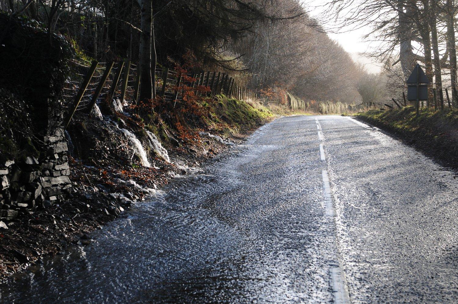 Water running off a hill onto the A708 near Foulshiels in the Yarrow Valley.