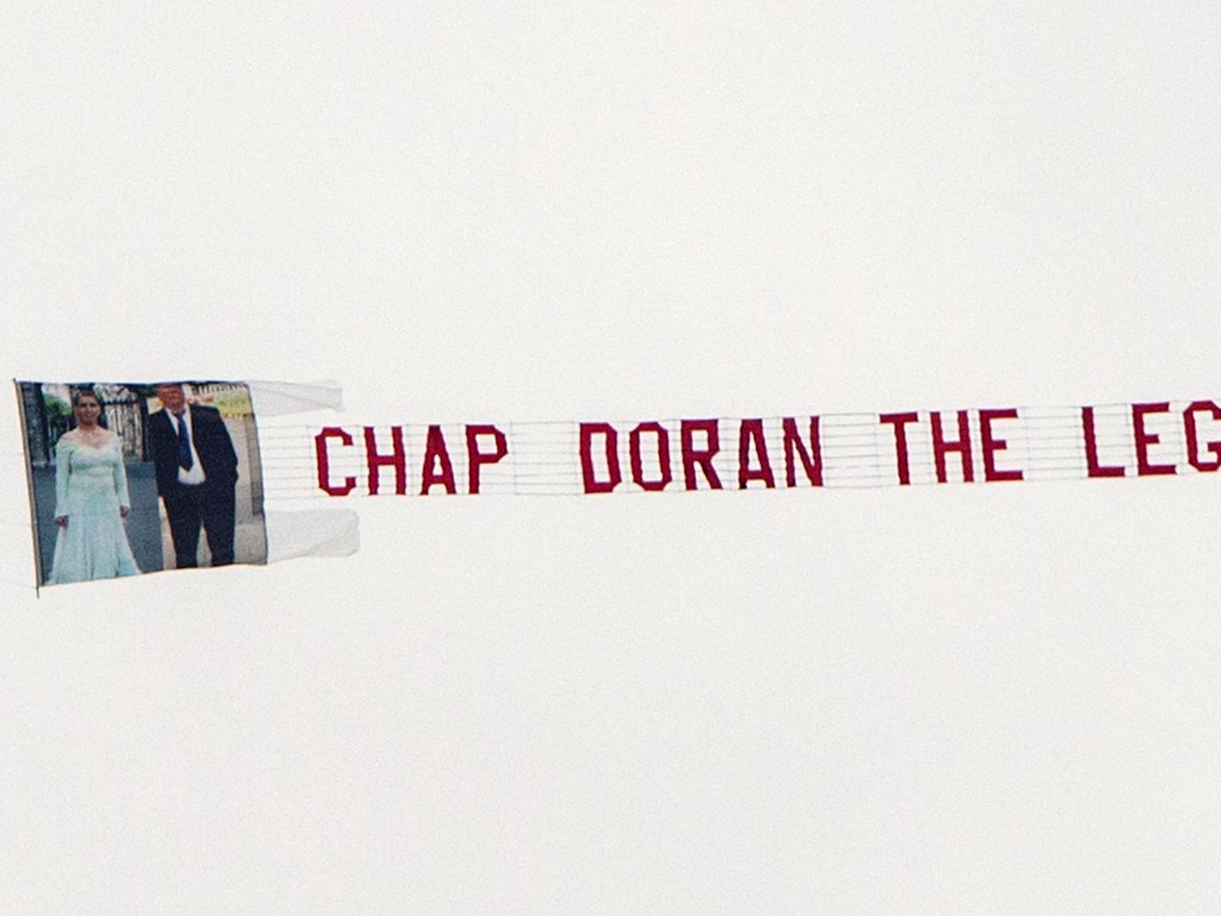 "Chap Doran the legend" was written on flags, the coffin and even on this banner which was flown over Kettering