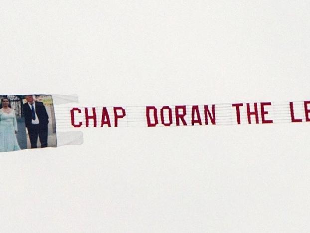 "Chap Doran the legend" was written on flags, the coffin and even on this banner which was flown over Kettering