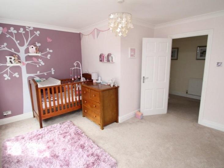 This pretty nursery has been decorated really nicely