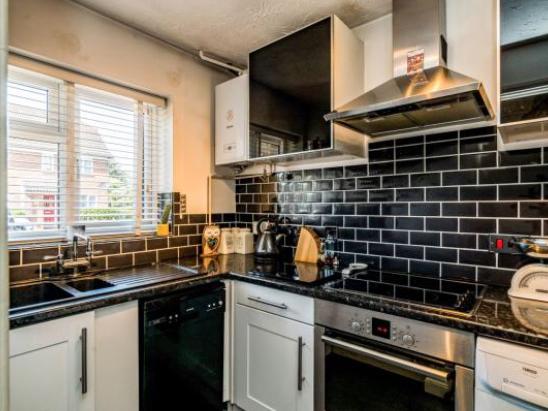 It has a modern kitchen and is on the market for 250,000