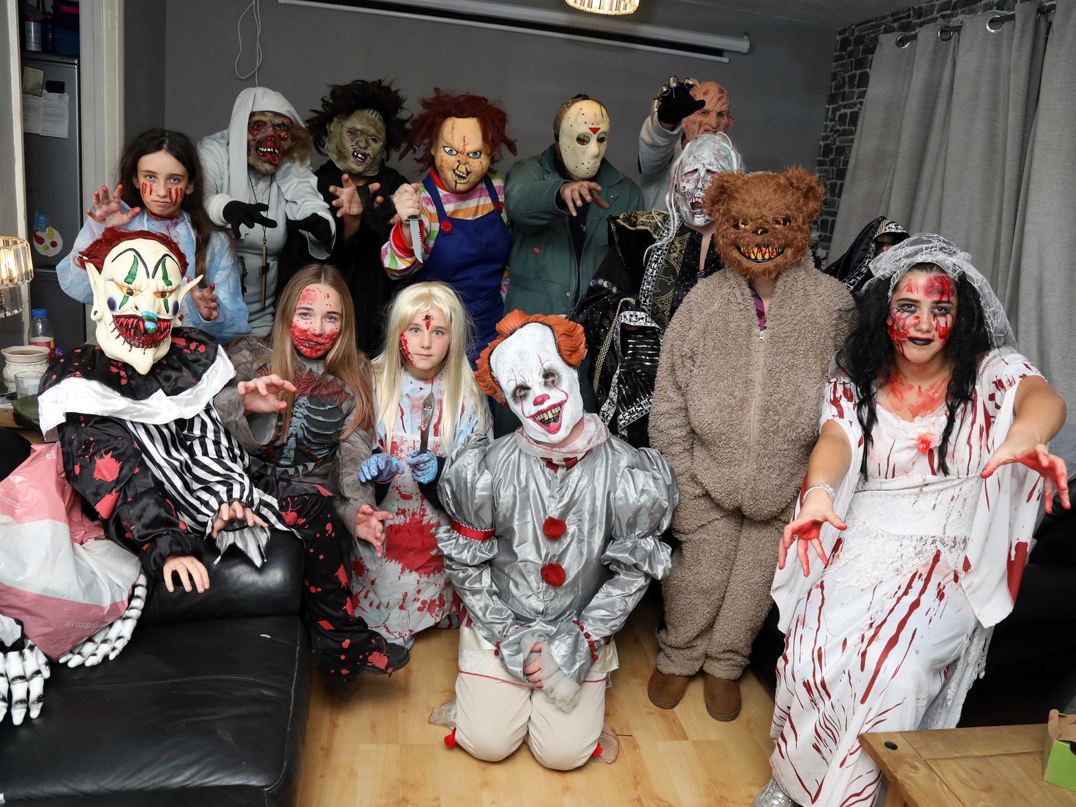 Jackie Mayes (second left, back row) was joined by lots of family and friends to take part in the House of Horror