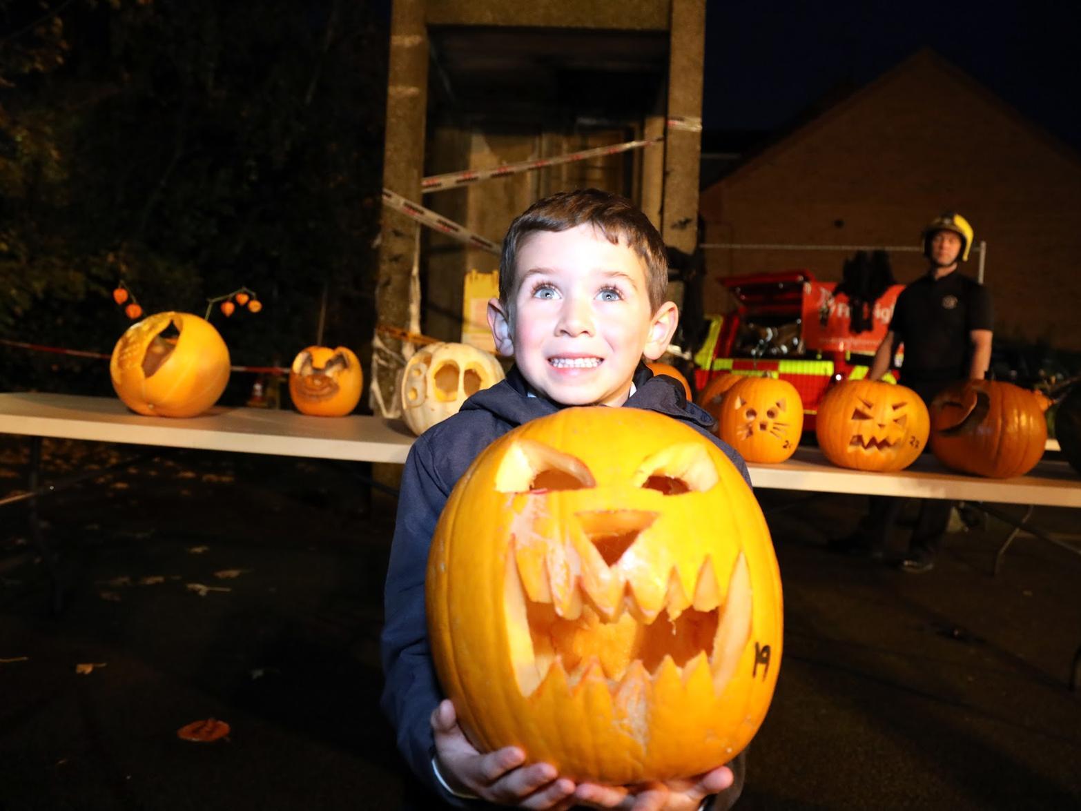 One young participant with his pumpkin