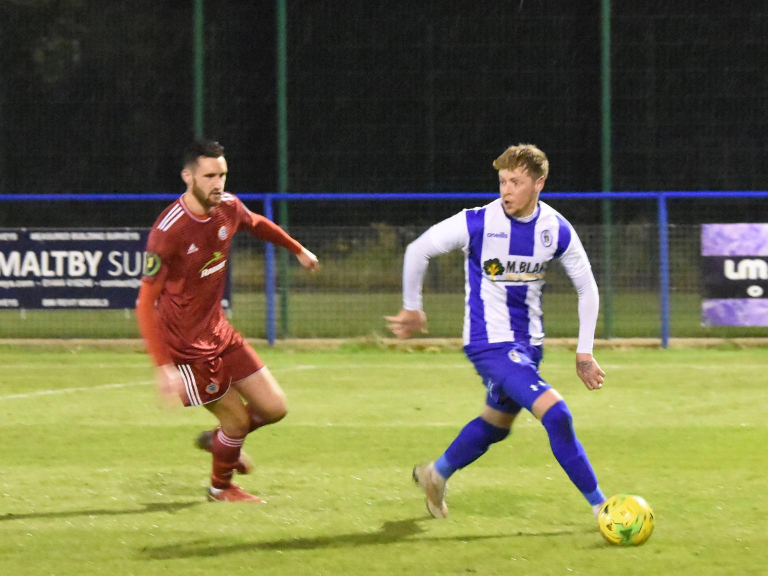 Callum Saunders turns away from a defender.