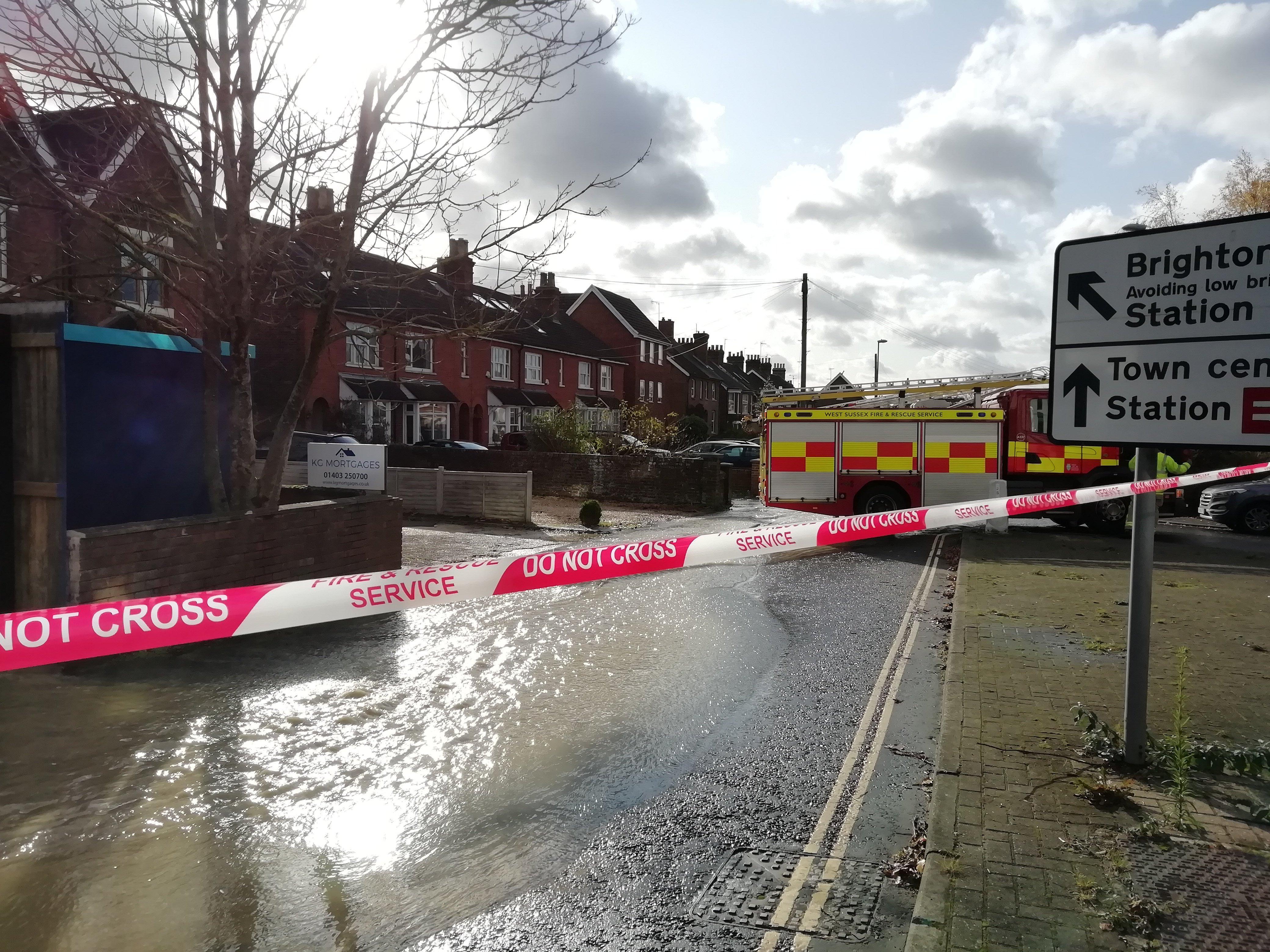 Station Road in Horsham is under a foot of water