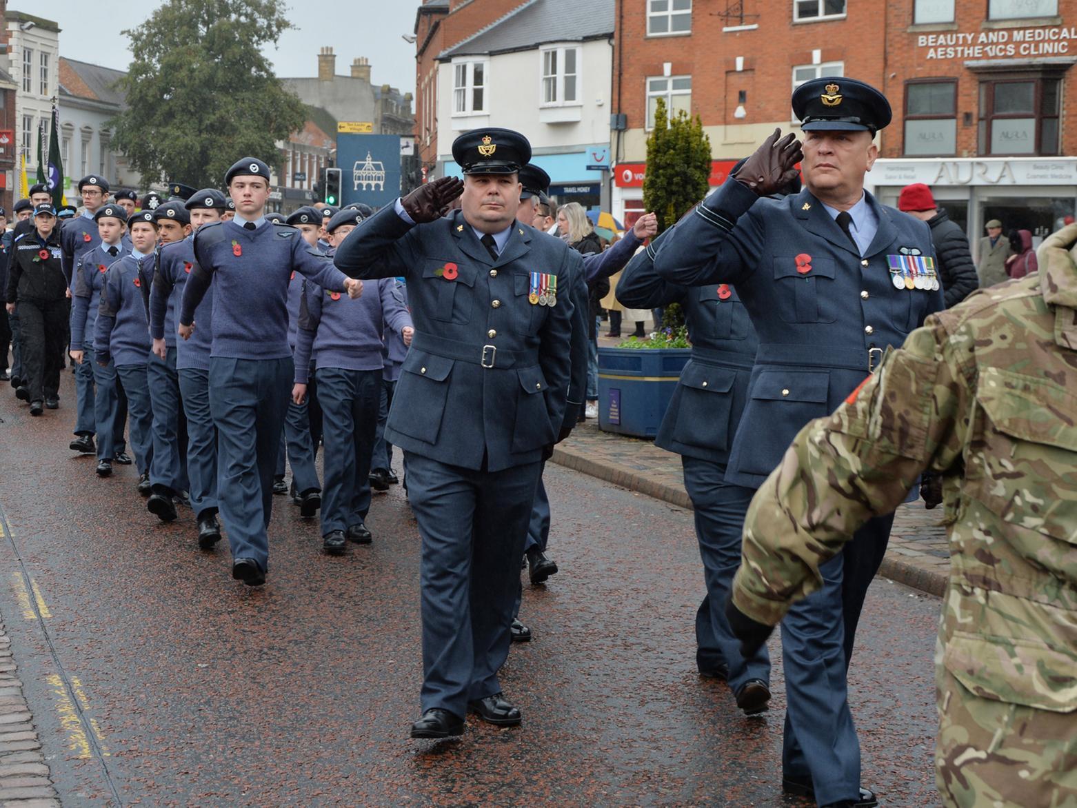 The remembrance parade makes its way to the Square.
