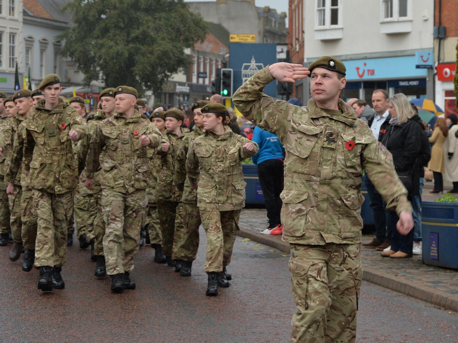 The remembrance parade makes its way to the Square.