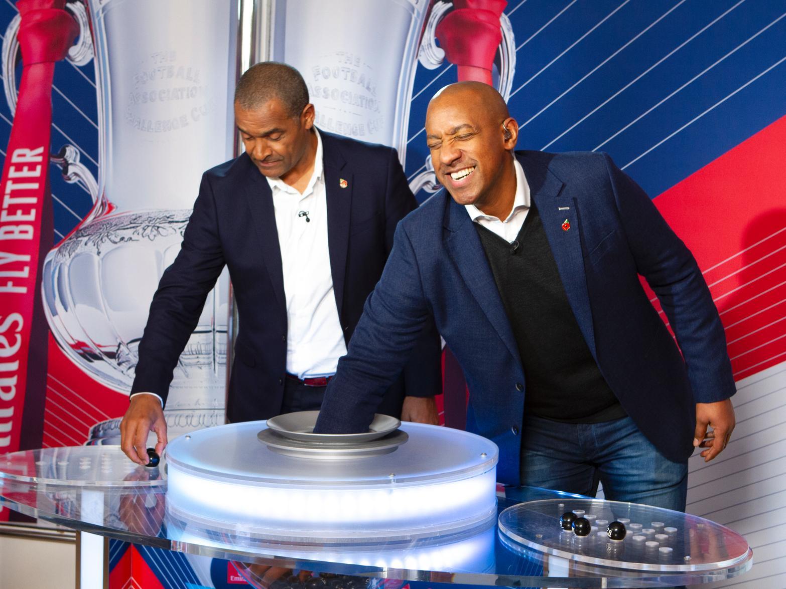 Mark Bright and Dion Dublin with the important bit / Picture by Neil Holmes
