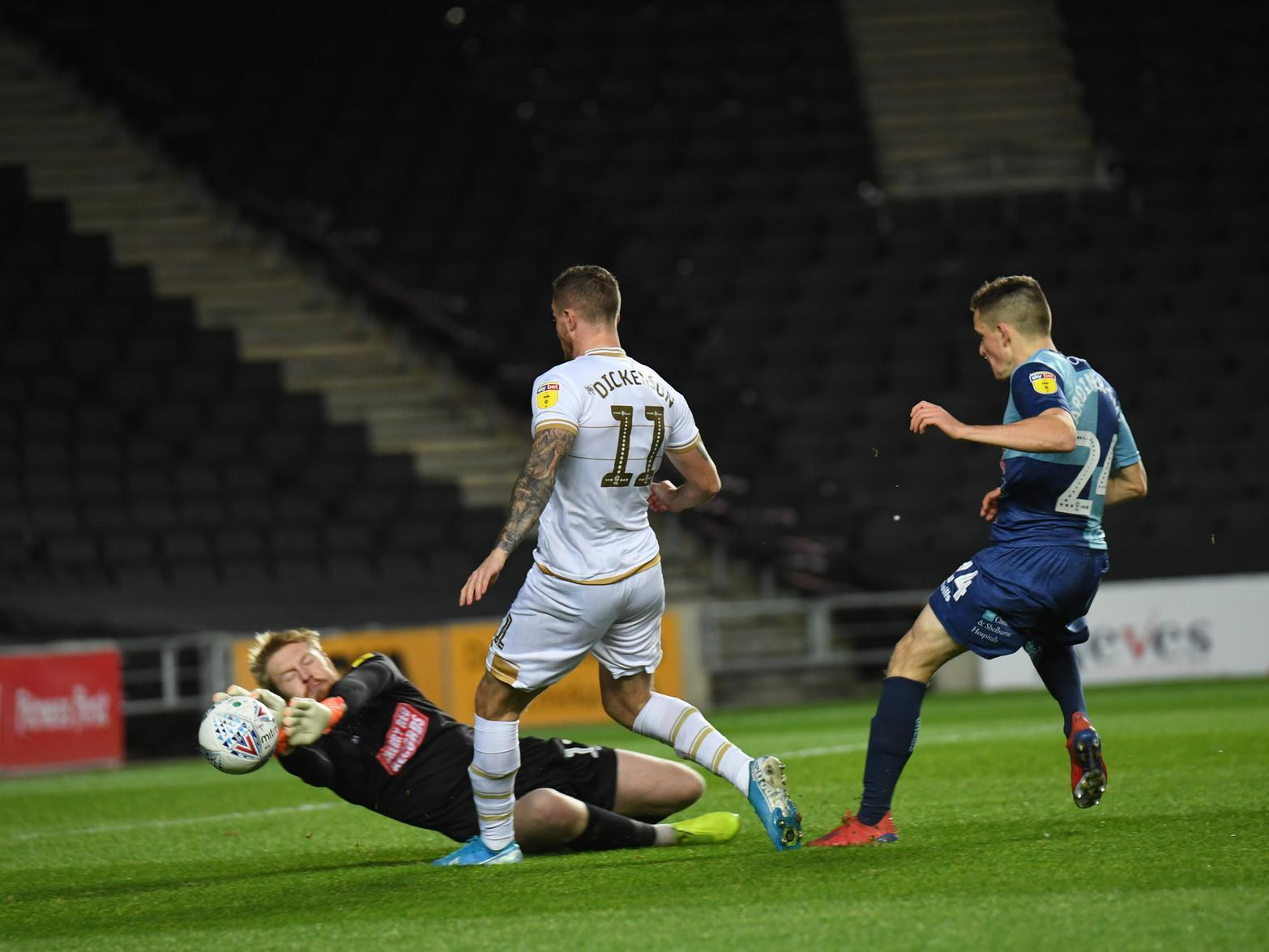Dickenson is denied by Wycombe keeper Cameron Yates
