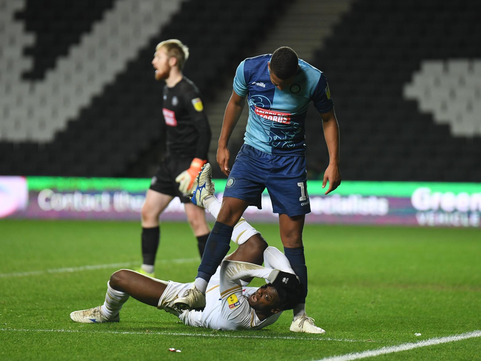 Agard floored by Giles Phillips, who too was sent off