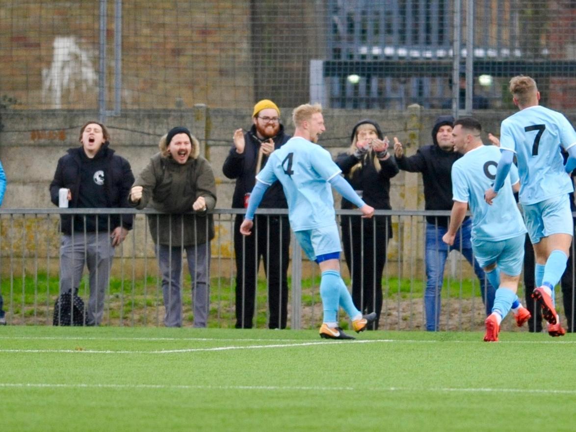 Dan Perry celebrates his goal for Eastbourne Town
