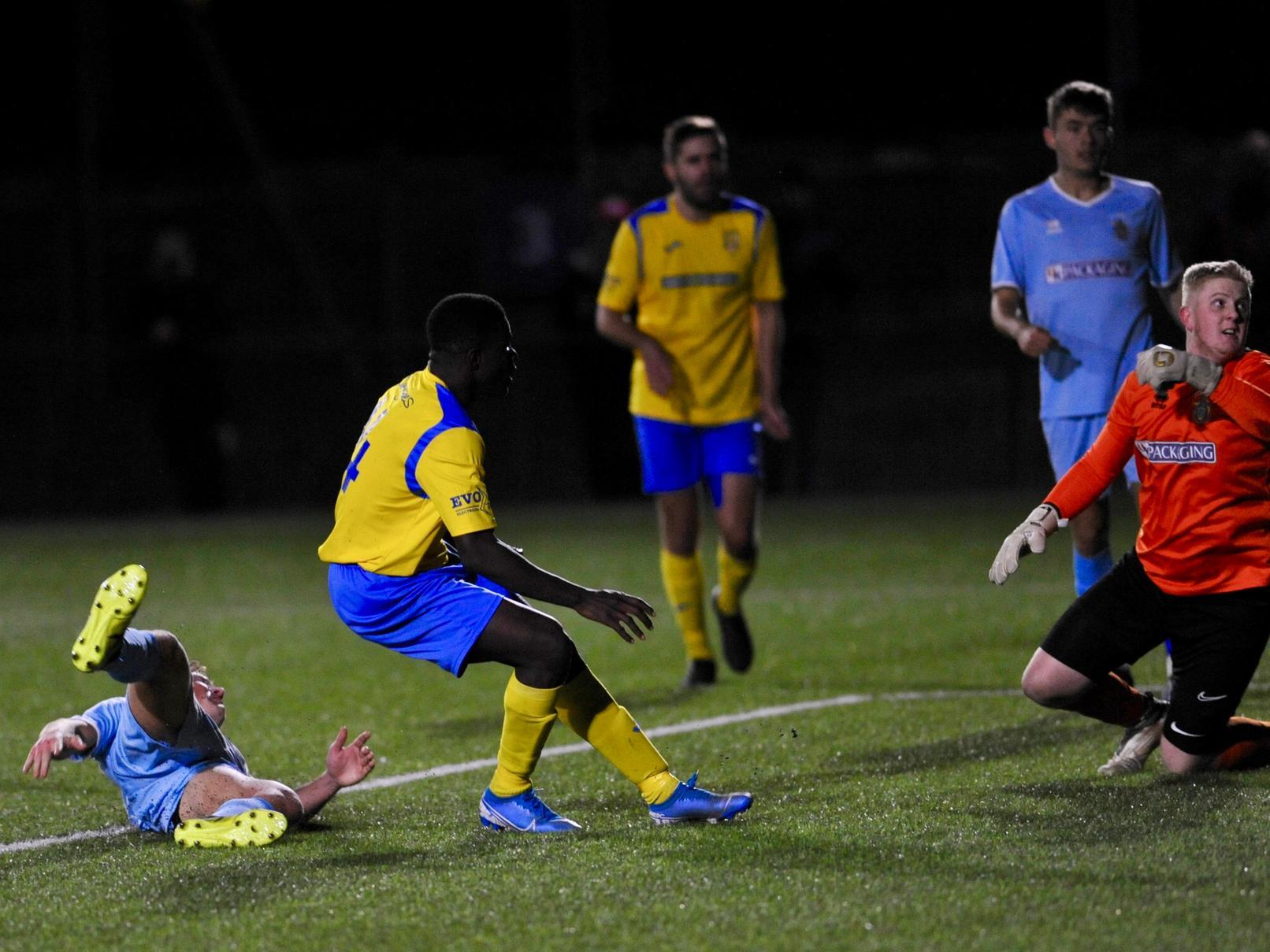 Action from Lancing v Eastbourne Town.