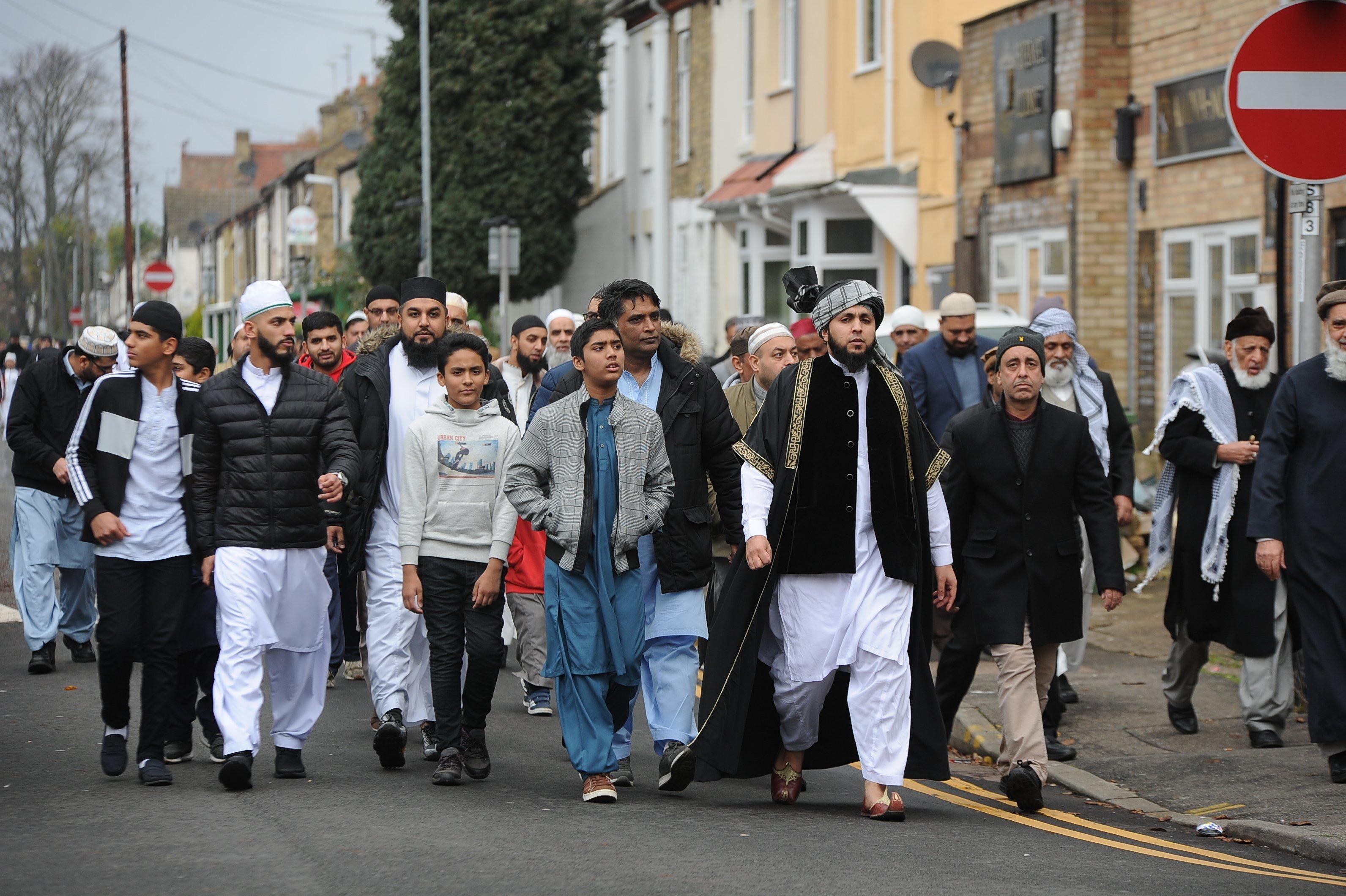 The march to celebrate the birthday of the Prophet Muhammad (Milaad Un Nabi)  from  Masjid Ghousia mosque to  Faizan-E-Madina mosque in Peterborough EMN-191117-155021009