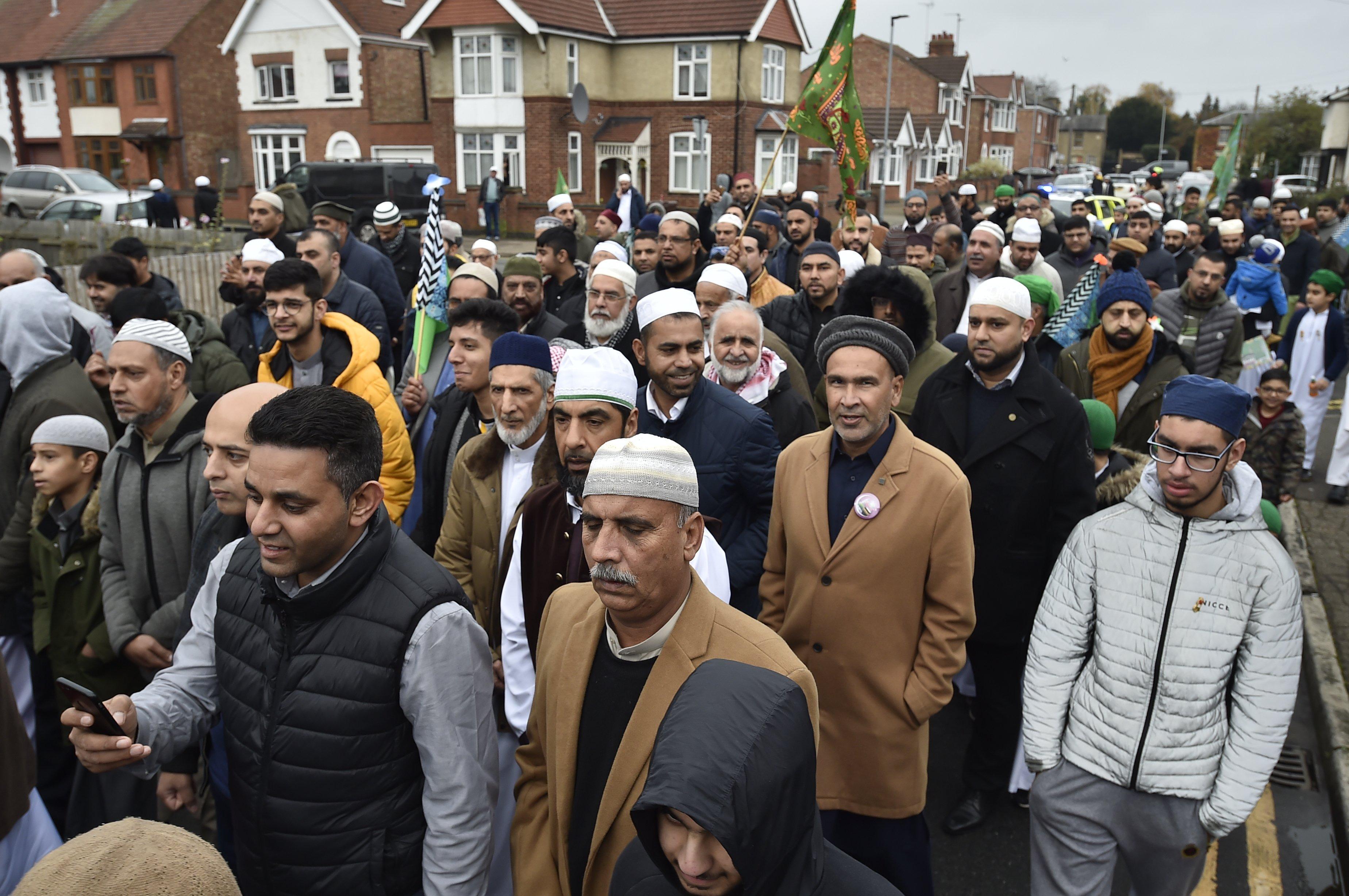 The march to celebrate the birthday of the Prophet Muhammad (Milaad Un Nabi)  from  Masjid Ghousia mosque to  Faizan-E-Madina mosque in Peterborough EMN-191117-155255009