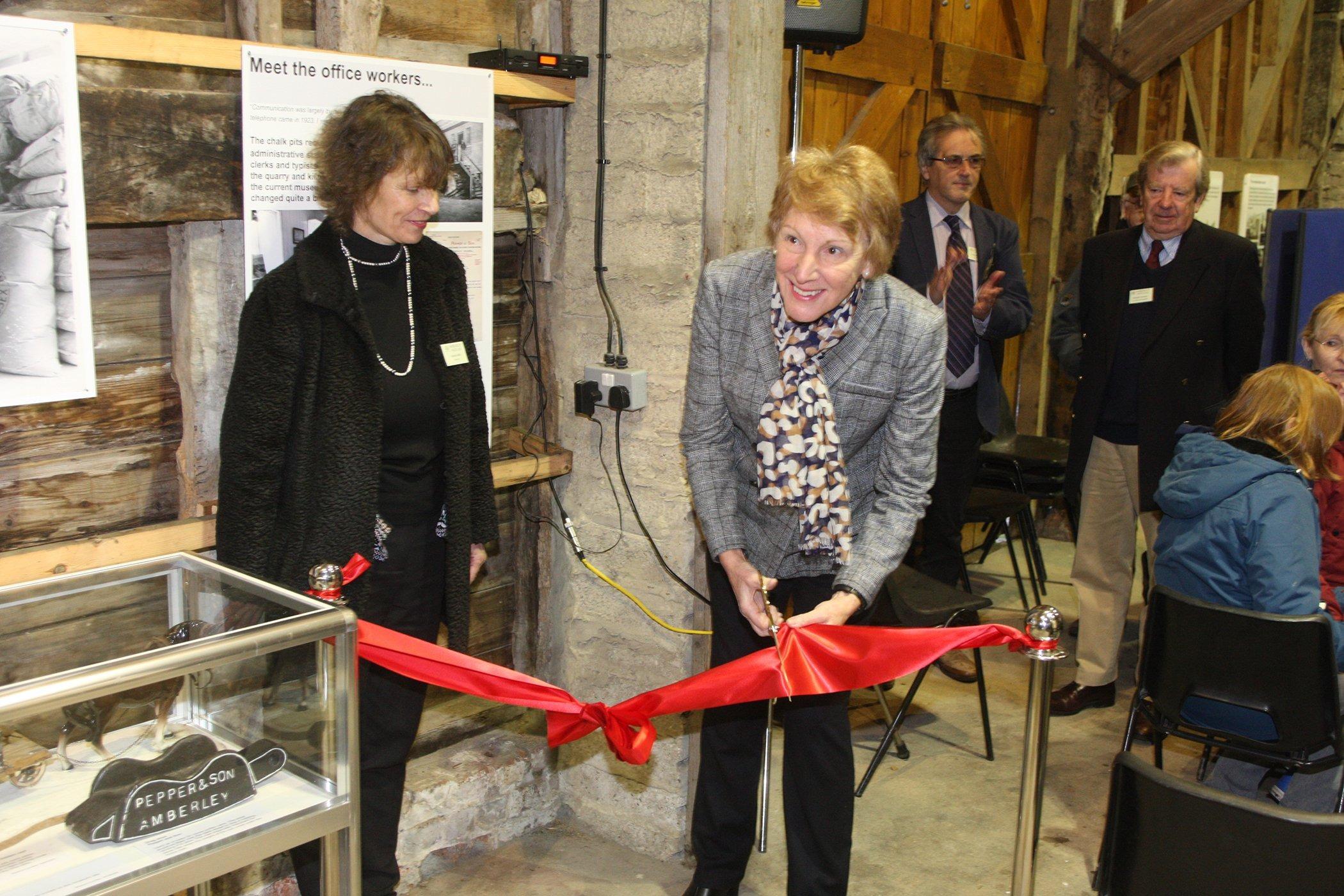 The Lord Lieutenant of West Sussex, Susan Piper cuts the ribbon accompanied by director Valerie Mills. Photo by Derek Martin Photography. SUS-191118-181355008