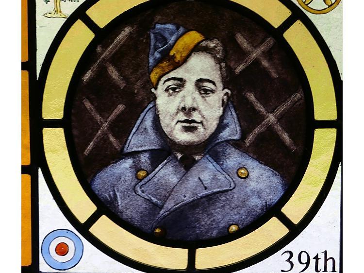 A window commemorating Harry Clack, the youngest RAF recruit and casualty of WW2