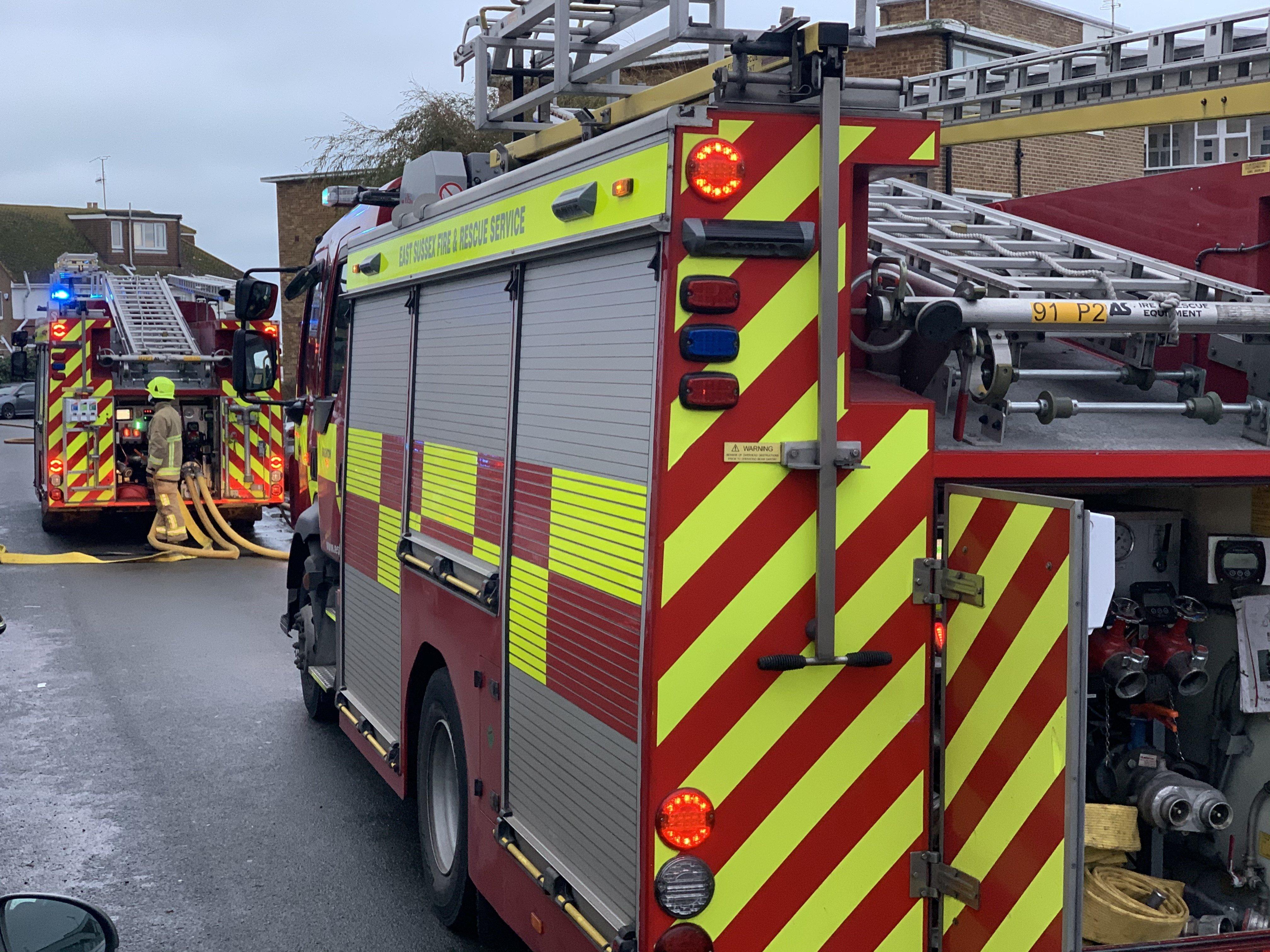 Firefighters at a building fire in Lancing SUS-191124-164915001